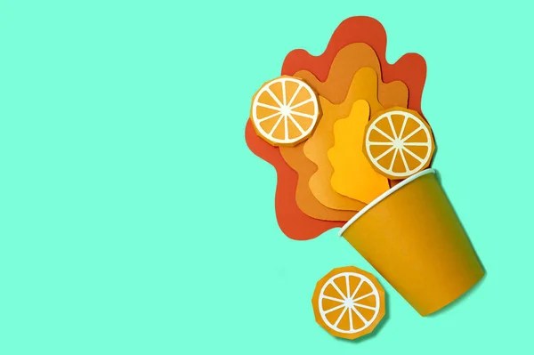 Paper cup with spilled orange juice — 스톡 사진