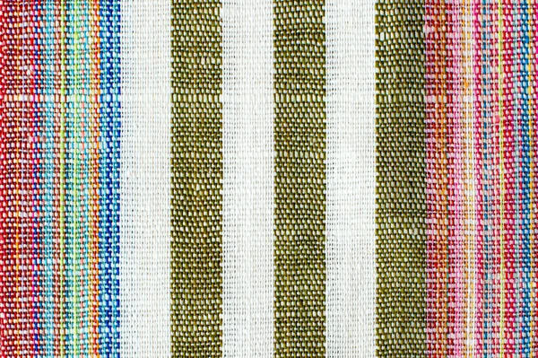 Background from vintage natural linen fabric. Flax texture. Striped colorful linen fabric. Canvas texture