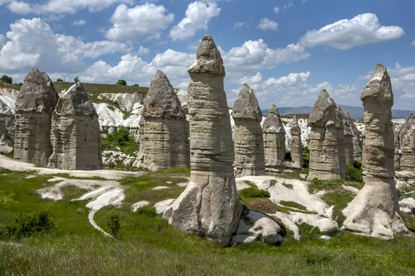 A series of volcanic rock formations known as fairy chimneys in Love Valley at Goreme in the Cappadocia region of Turkey.