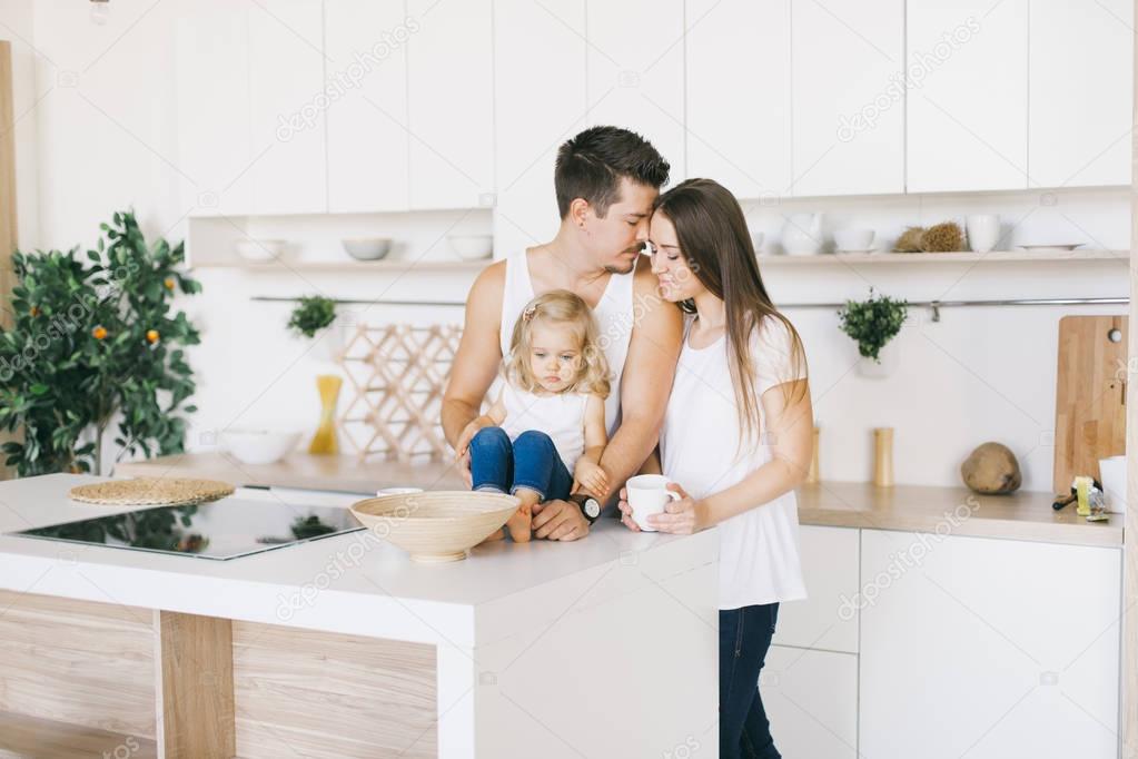 young beautiful family spending time together at home