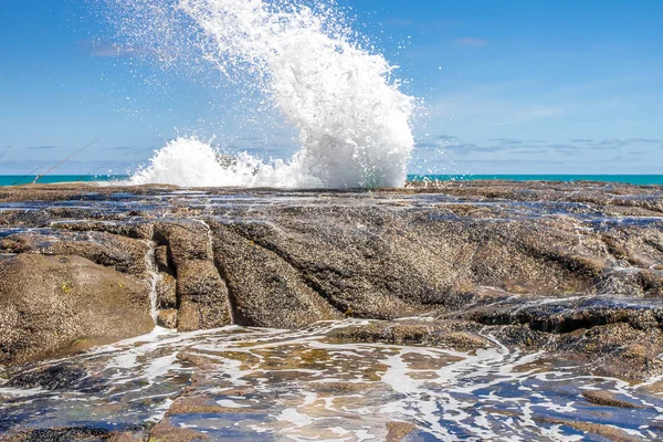 Muriwai beach, splashing water — Stock Photo, Image