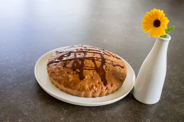 Homemade pie with yellow flower — Stock Photo, Image