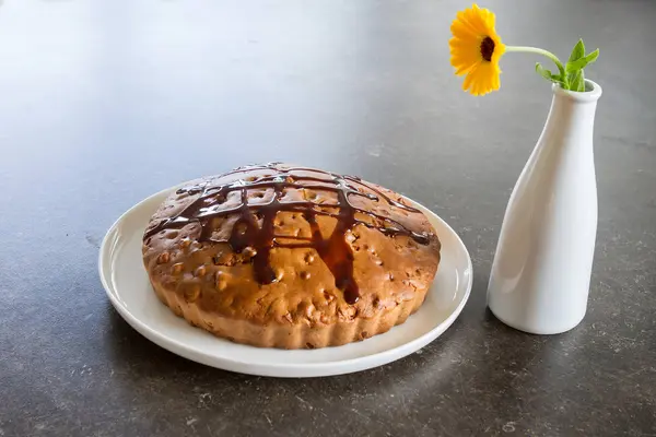 Homemade pie with yellow flower — Stock Photo, Image