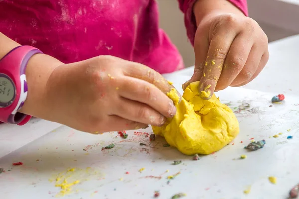 Girl playing with play dough — Stock Photo, Image