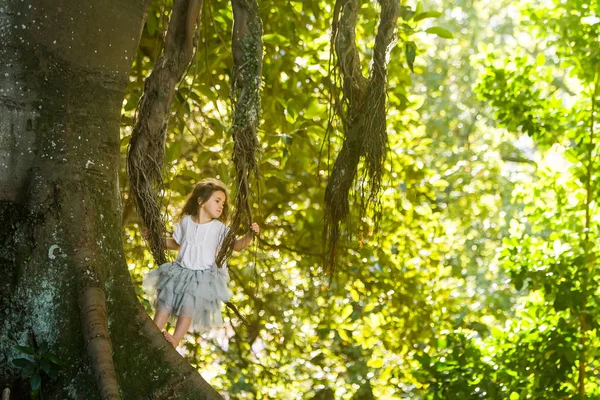 Outdoor portrait of young child girl in magic forest — Stock Photo, Image