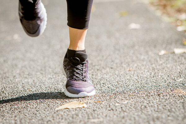  jogging or walking in park