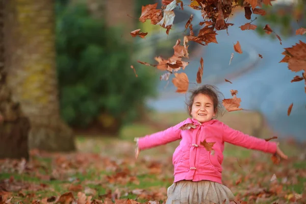 Outdoor portrait of young happy child girl — Stock Photo, Image