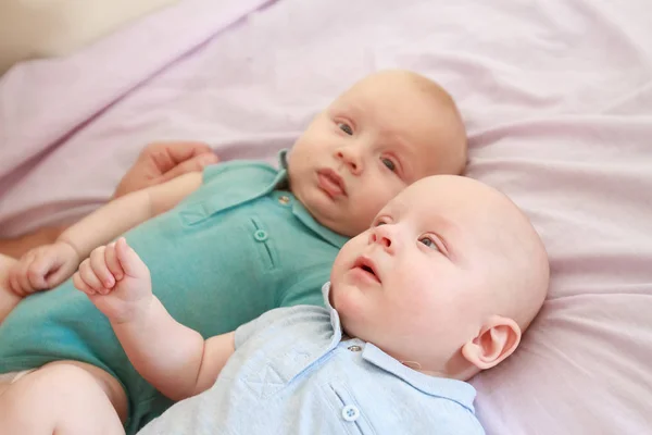 Indoor portrait of baby twins — Stock Photo, Image