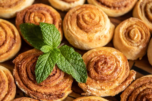 Freshly Baked Cinnamon Rolls Wooden Background — Stock Photo, Image