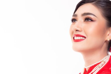 Beautiful makeup, red lips. Charming beautiful young asian woman has nice facial skin, nice hairdo with smile face, happiness. Portrait beauty young asian woman with chinese style. studio on white