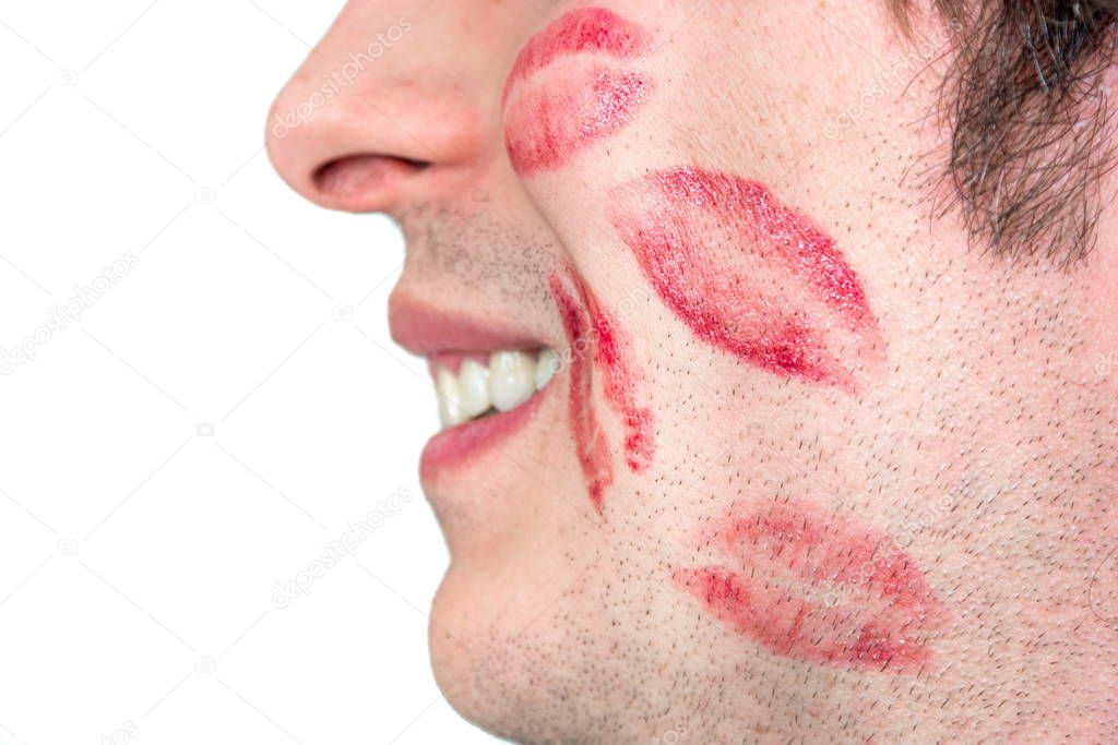 Caucasian white male man cheeks with red lipstick kiss marks smi