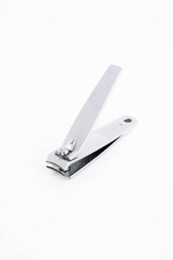 Single metal silver nail clipper macro close up shot isolated ag