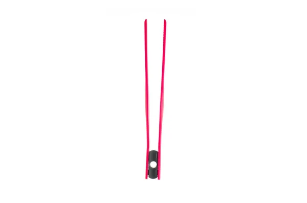Única silicone rosa cozinhar pinças de plástico close-up tiro isol — Fotografia de Stock