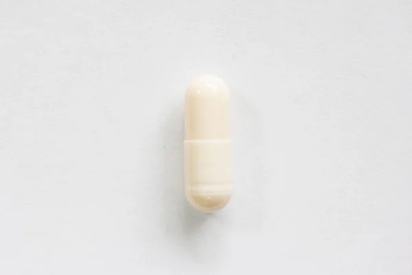 Cream Colored Medicine Soft Pill Capsule Macro Close Shot Isolated — Stock Photo, Image