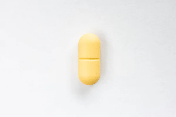 Yellow Colored Medicine Pill Capsule Macro Close Shot Isolated White — Stock Photo, Image