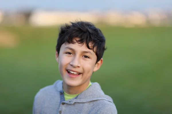 Young teen boy in the playing field — Stock Photo, Image