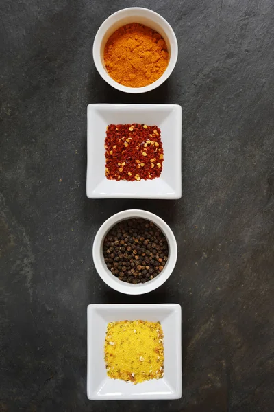 Various Spices Peppercorn Cumin Hot Peppers Turmeric Slate Background Copy — Stock Photo, Image