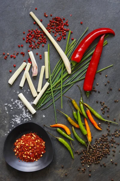 Ground Dried Chilli Peppers Fresh Peppers Lemon Grass Chives Slate — Stock Photo, Image