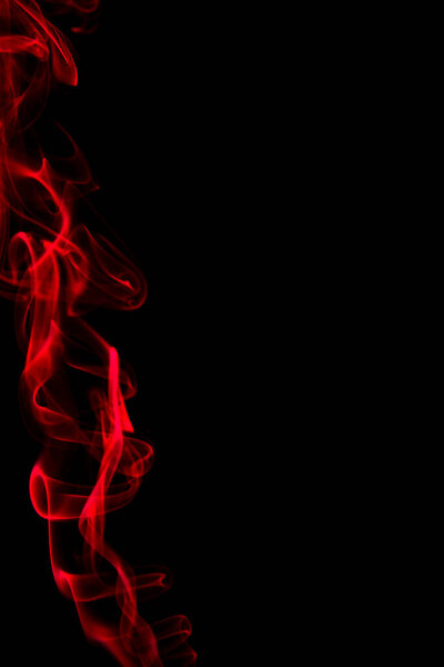 Abstract shape of red smoke on black background.