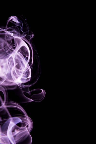 Abstract shape of violet smoke on black background.