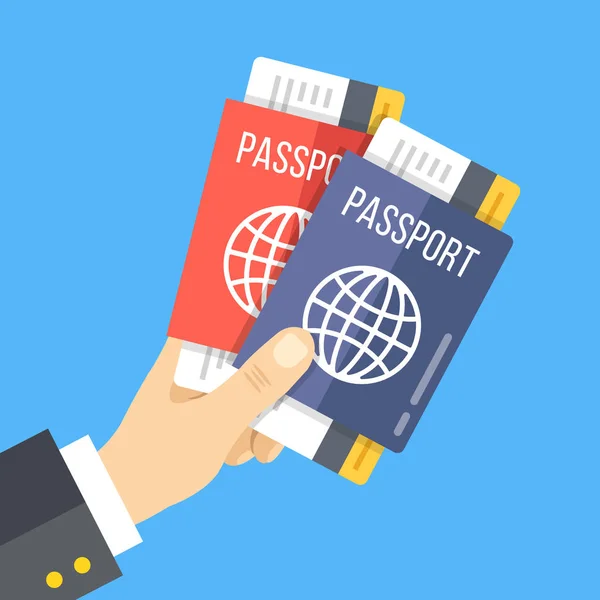 İki pasaport biletli tutan el. Vektör çizim — Stok Vektör