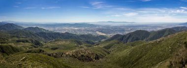 Breathtaking view of the San Bernardino Valley from the San Bernardino Mountains with Santa Ana Mountains visible in the distance, Rim of the World Scenic Byway, San Bernardino County, California clipart