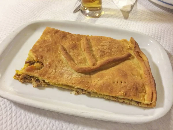 Galician empanada on white porcelain tray — Stock Photo, Image