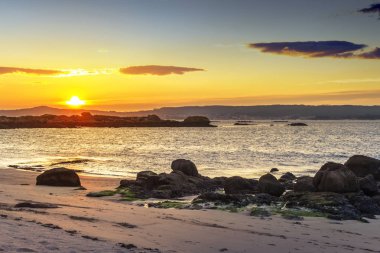 Alan da Secada plaj gün batımında