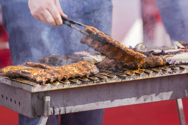 Chef bbq grilled pork ribs on smoke — Stock Photo, Image
