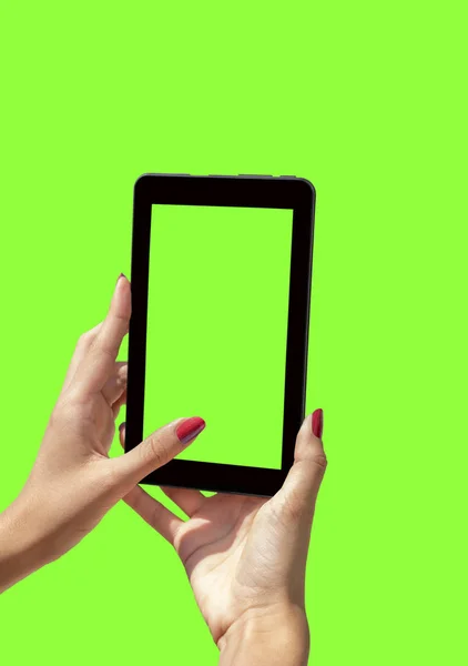 Young girl hand holding a tablet on green screen — Stock Photo, Image