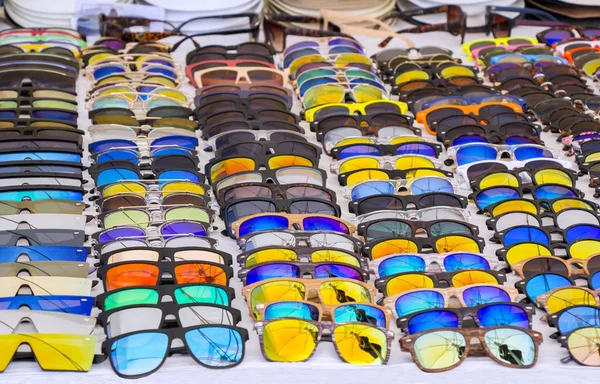 Colorful Sunglasses for sale at street market — Stock Photo, Image