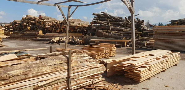 Pile of logs in a sawmill for further processing