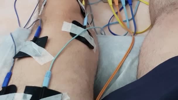 Elektrostimulering Quadriceps Som Sjukgymnastik Video — Stockvideo