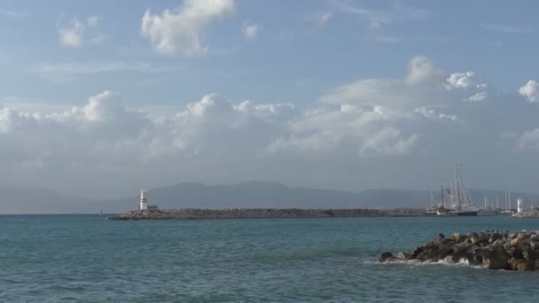 Beautiful view of the sea, the lighthouse and the ship — Stock Video