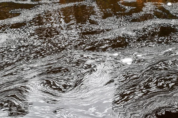 Пена на реке — стоковое фото