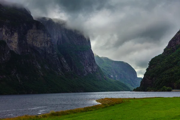 Cloudy rainy mountains and fjord in Norway, — Stock Photo, Image