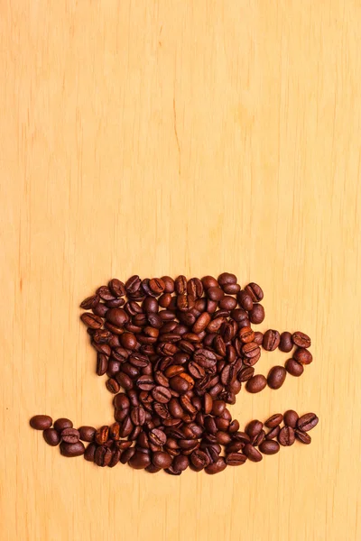 Filiżanka kawy wykonana z palonej fasoli — Zdjęcie stockowe