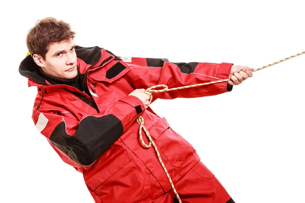 Young man pulling rope. — Stock Photo, Image