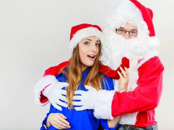 Attractive lady with Santa Claus. — Stock Photo, Image