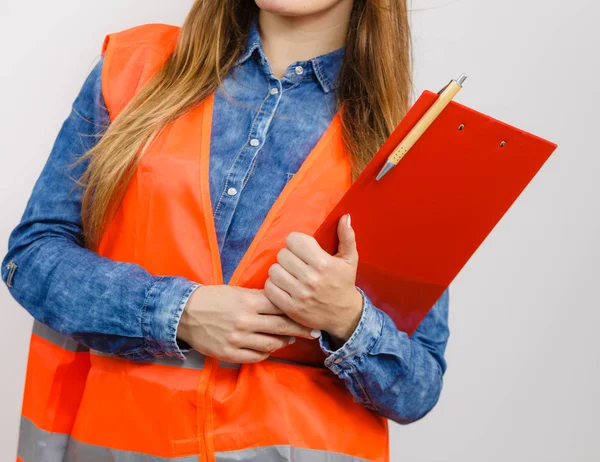 Woman engineer construction builder holds file pad. — Stock Photo, Image