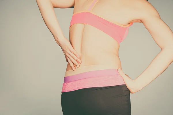 Woman with medical kinesio taping on back — Stock Photo, Image