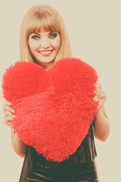 Woman gorgeous girl holding red heart love symbol — Stock Photo, Image