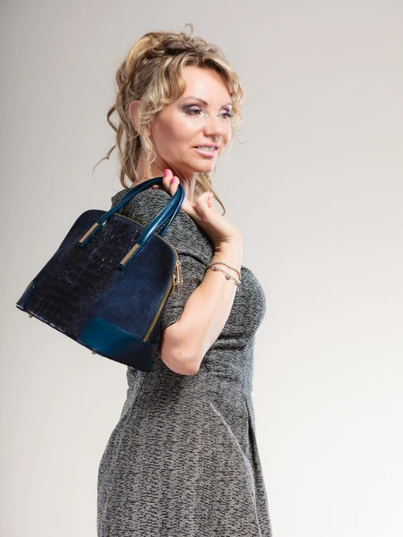 Mature lady with handbag. — Stock Photo, Image