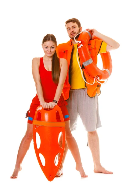 Lifeguards with rescue ring buoy and life vest. — Stock Photo, Image