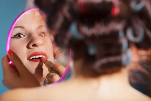 Girl applying make up red lipstick — Stock Photo, Image