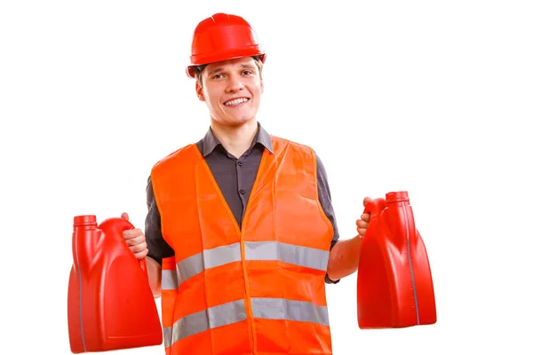 Worker in safety vest with oil fuel. — Stock Photo, Image