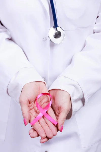 Female hands with pink ribbon — Stock Photo, Image