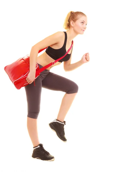 Sport. Fitness sporty girl with gym bag running to training — Stock Photo, Image