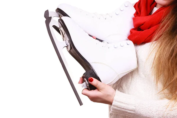 Woman holding ice skates — Stock Photo, Image