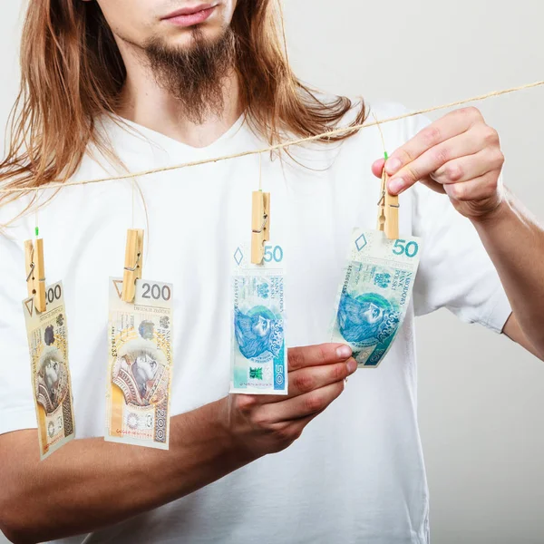 Rich man with laundry of money — Stock Photo, Image